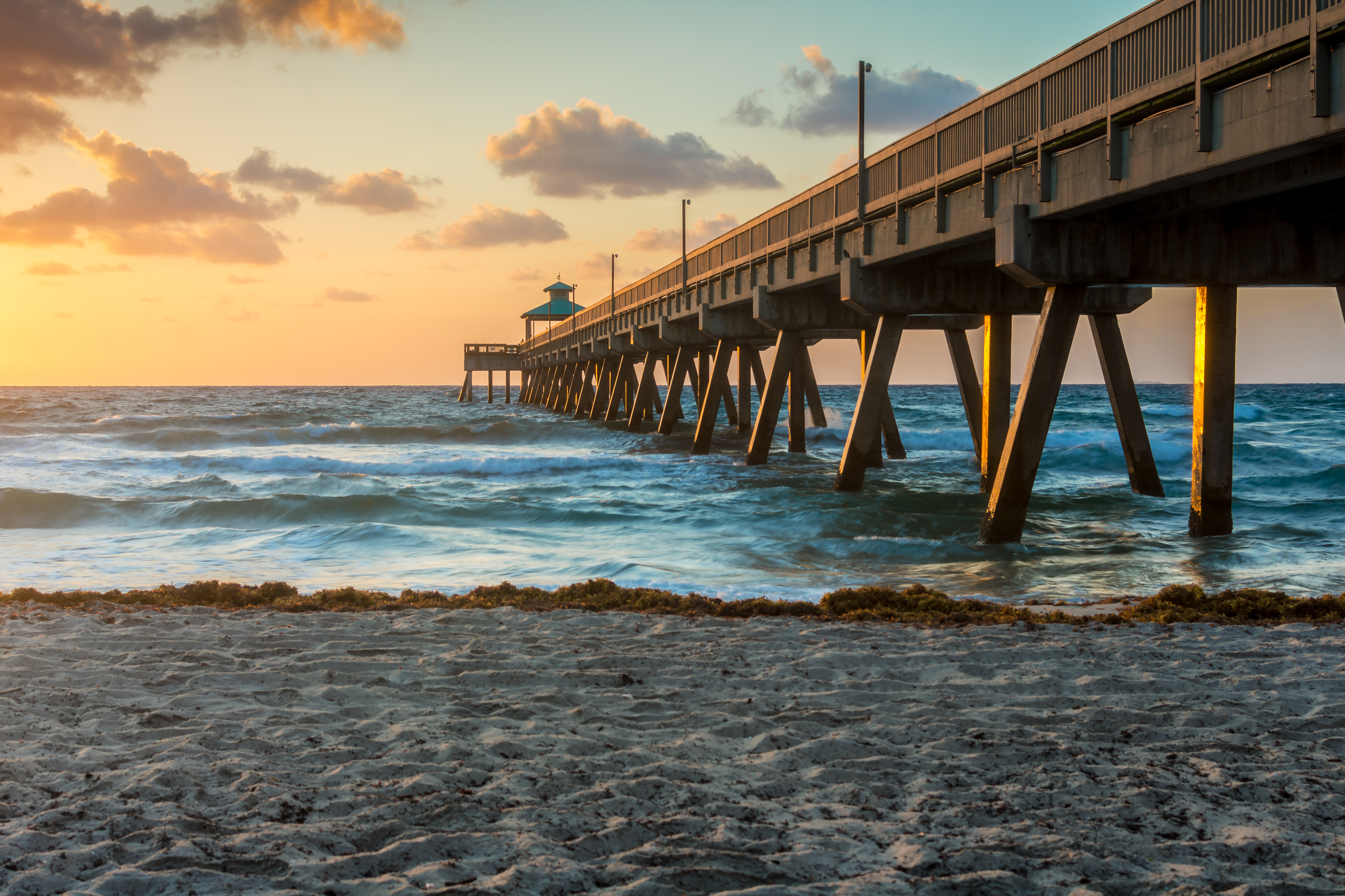 Photo of a pier on the beach